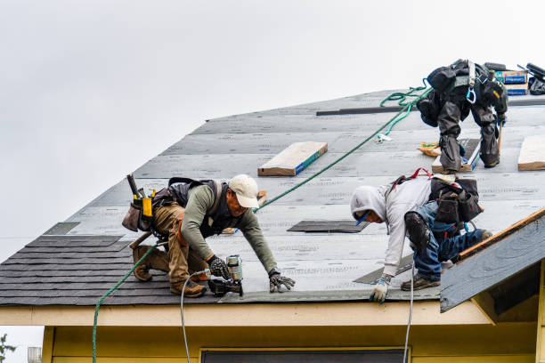 Professional Roofing technician working in Marlborough, MO